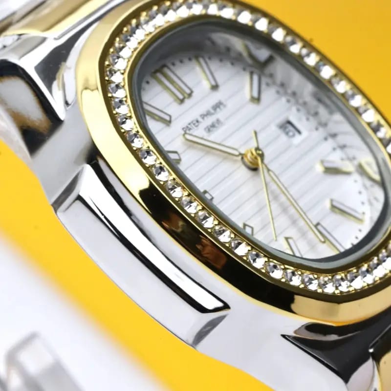Patek Phillipe – Gold & white – Diamonds